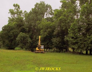 13 Trackhoe Crosses Pasture