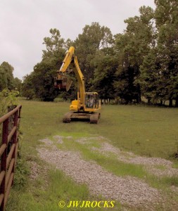 14 Trackhoe Approaches Gate